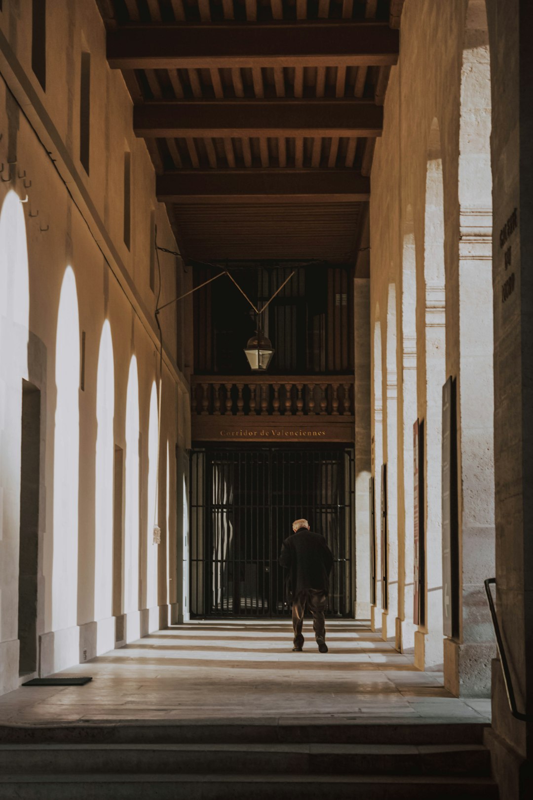 man standing inside building