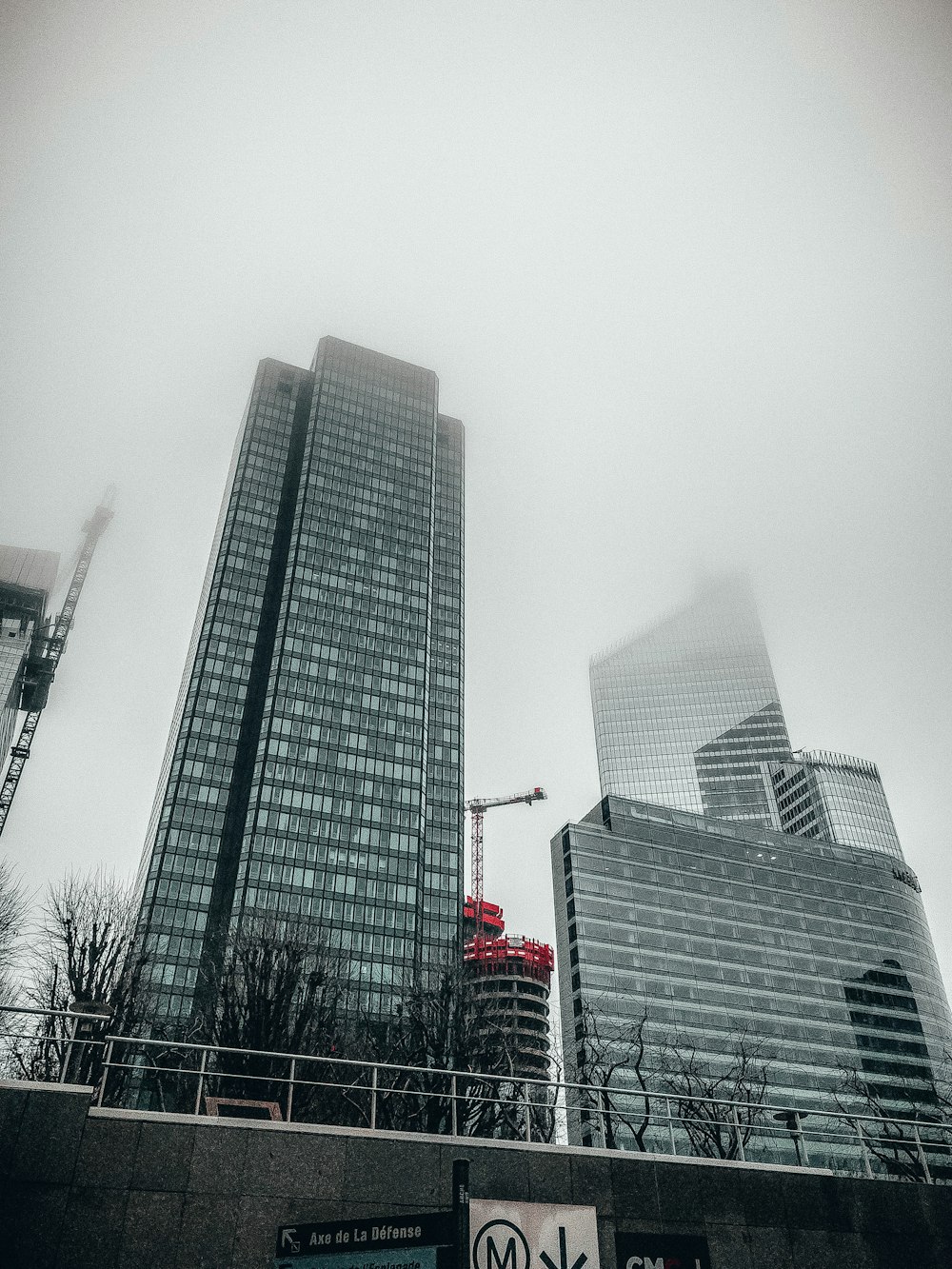 low-angle photography of curtain-wall high-rise building during daytime