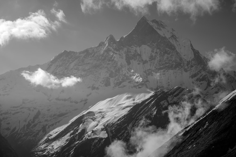 grayscale photography of snow-covered mountain during daytime