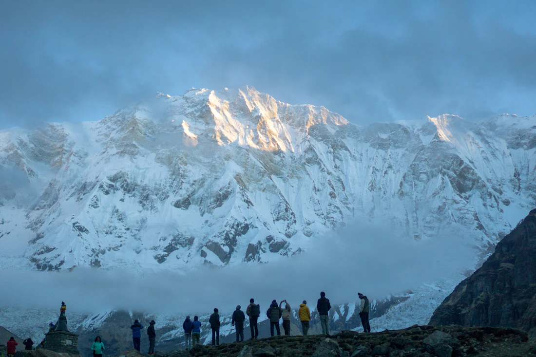 Climbers on a snowy Himalayan ridge