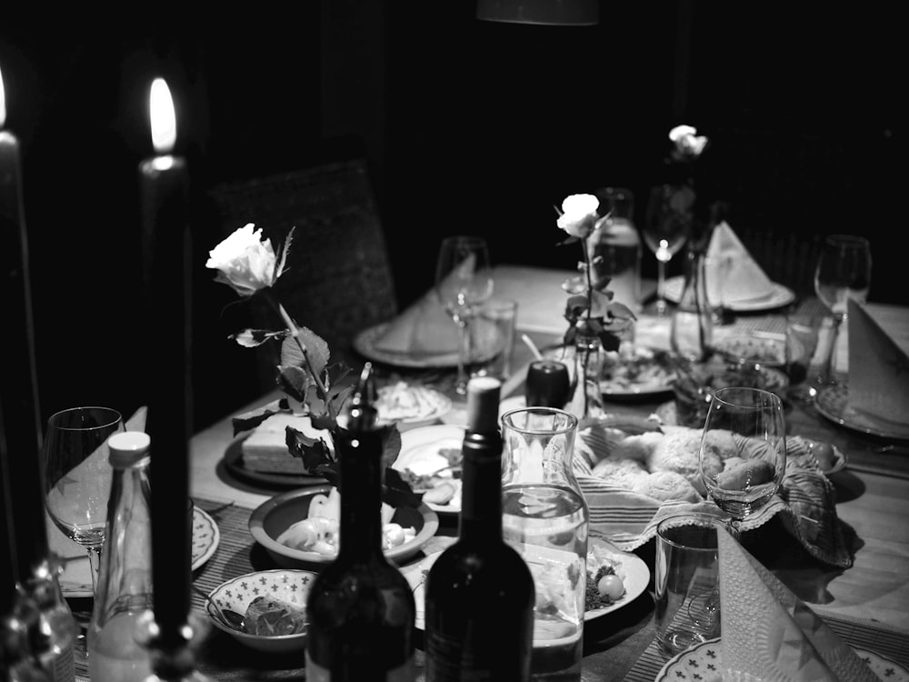 grayscale photo of cooked foods on table