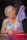 woman wearing white and pink floral tank dress holding purple textile