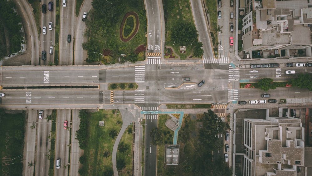 aerial photography of vehicles passing on super highway during daytime