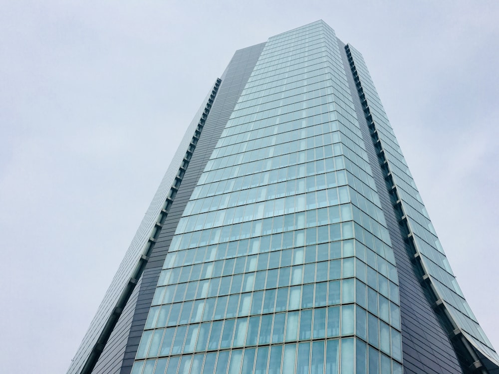 low angle photography of glass curtain building during daytime