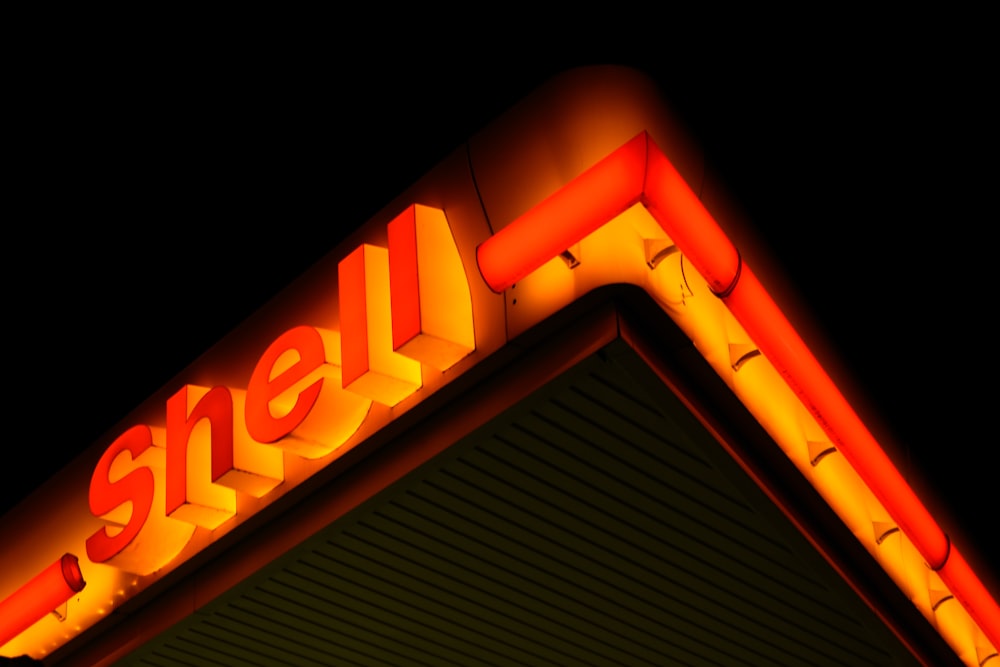 low angle photography of Shell gas station at night