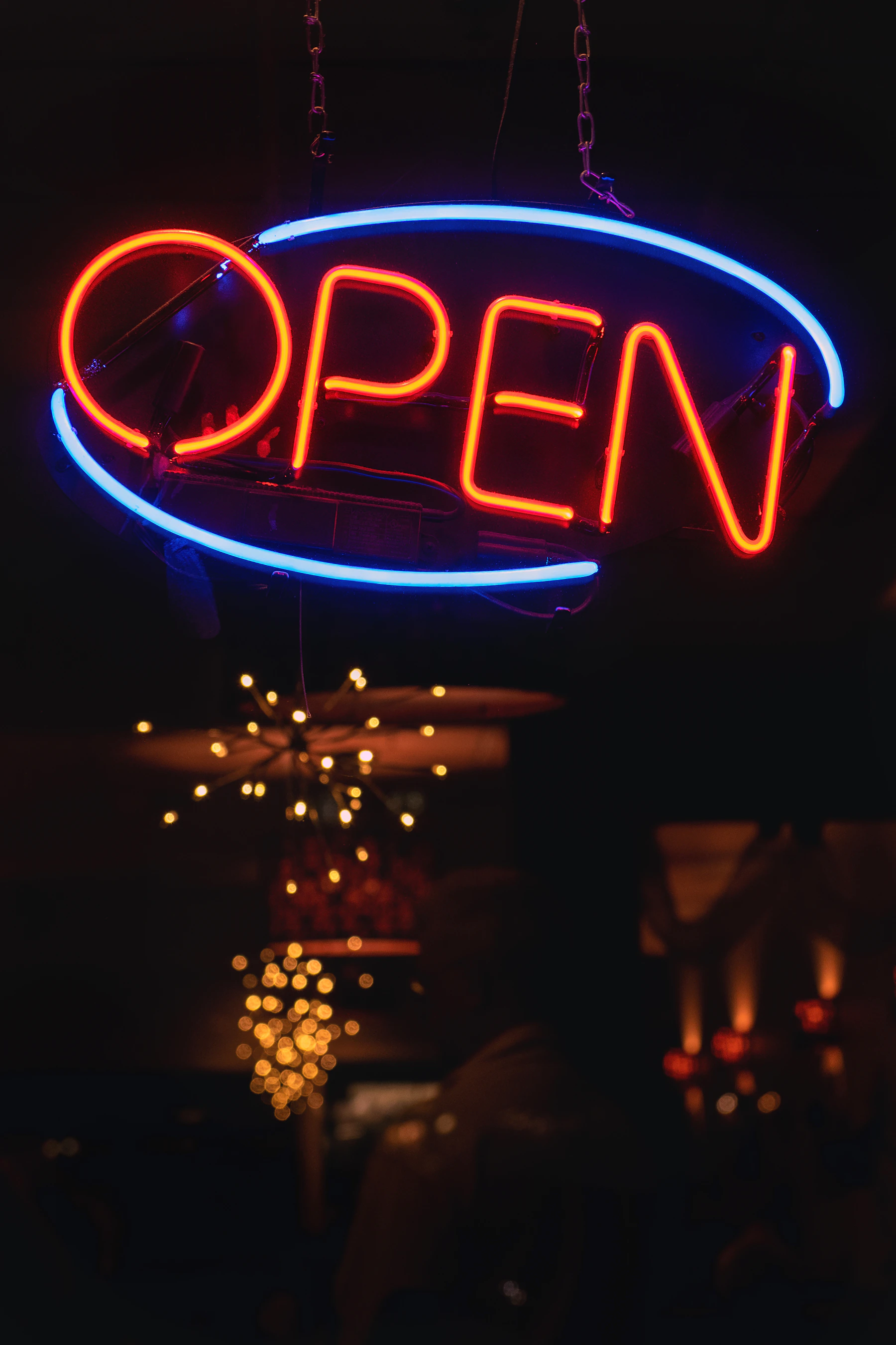 Neon sign with OPEN in a shop window