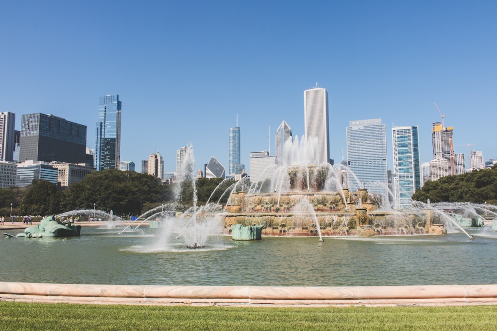 water fountain near high-rise buildings