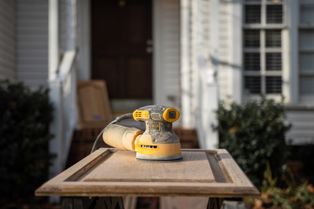 yellow and black wood router