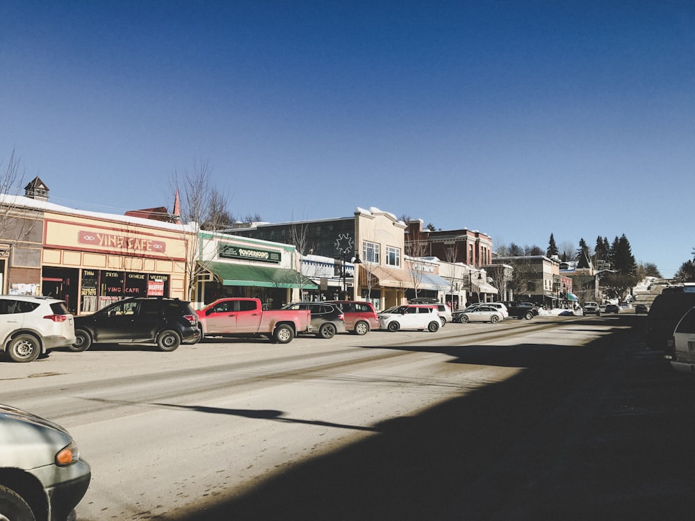 cars parked on both sides of empty street