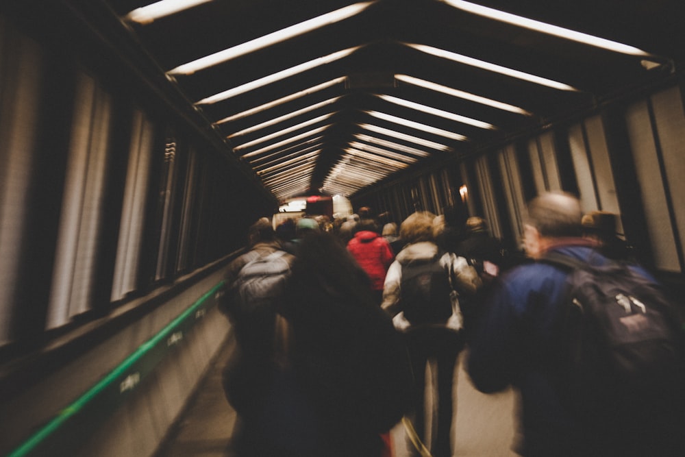 people walking on tunnel