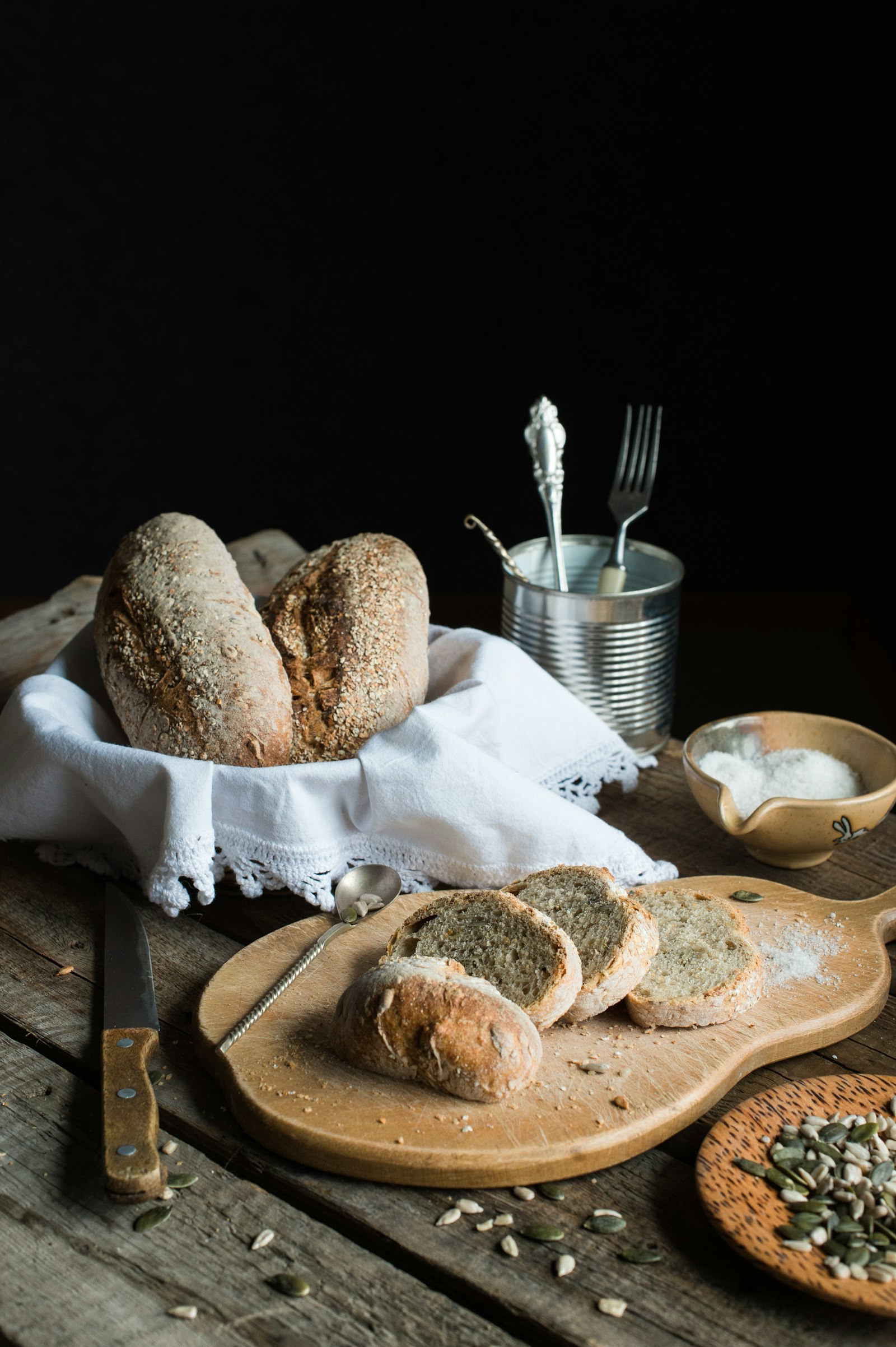 Nikon Df sample photo. Breads on brown chopping photography