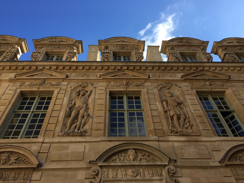 brown building under blue sky