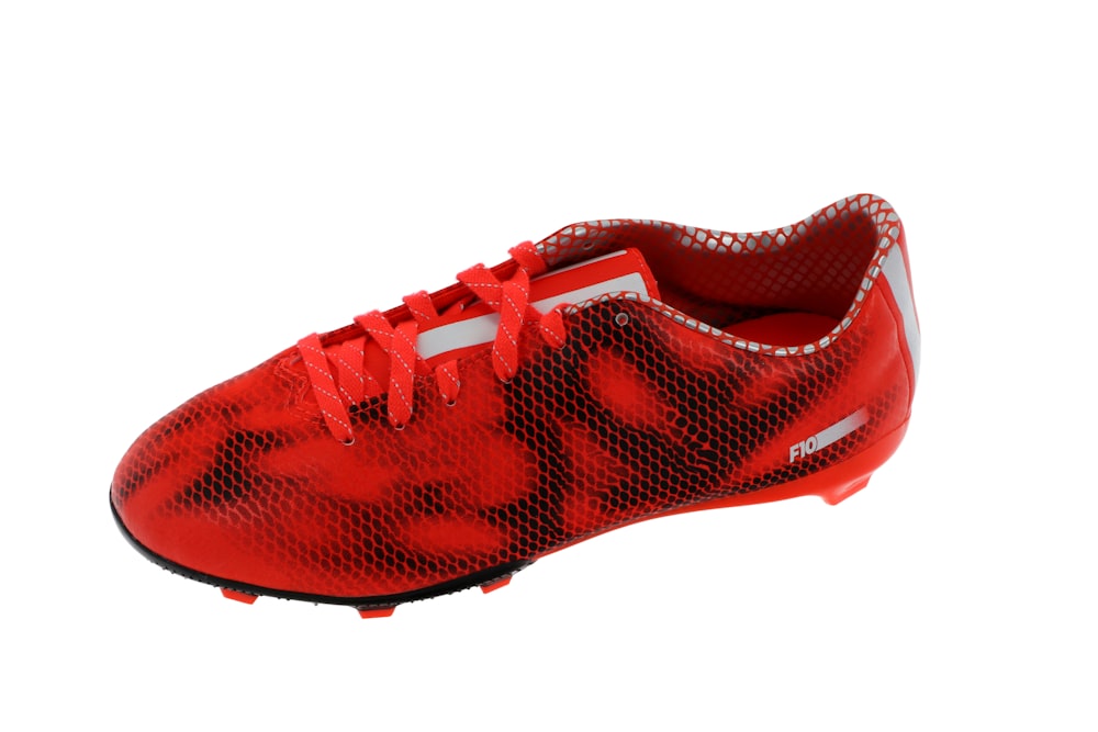 unpaired red and black cleat