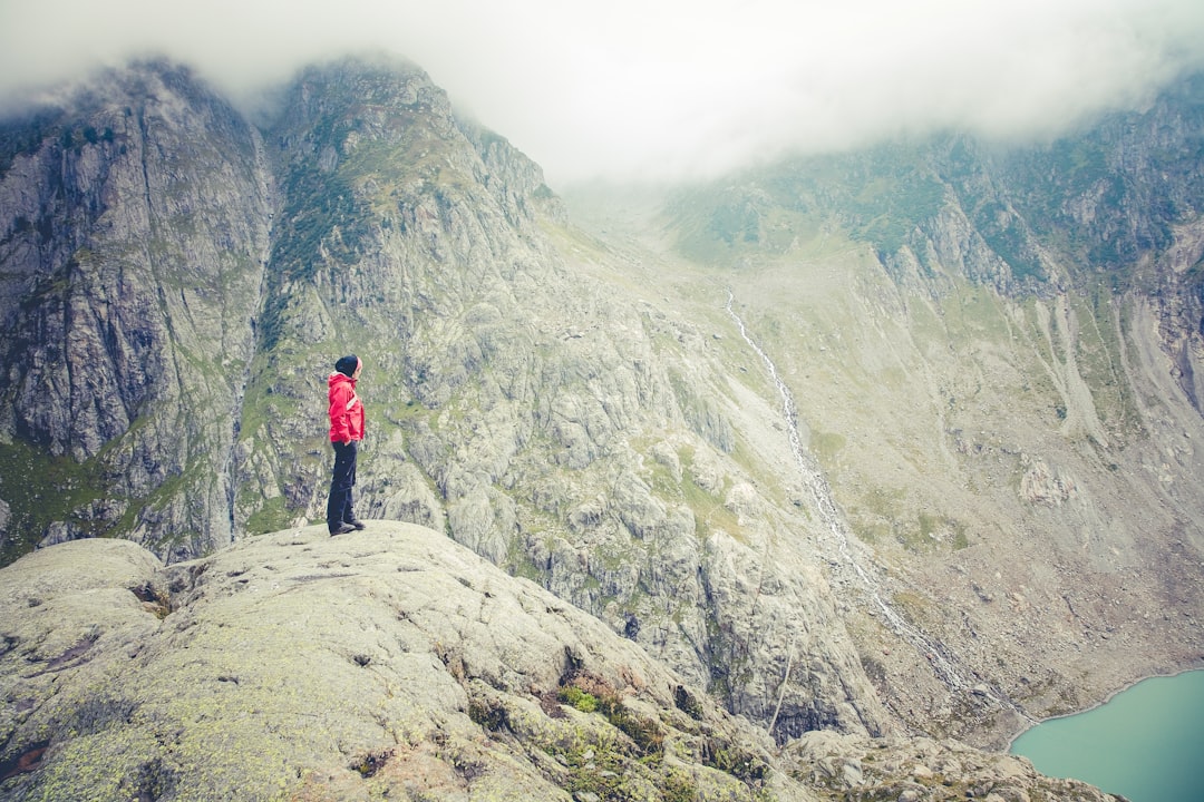 man standing on peak