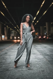 woman standing in the middle of the road