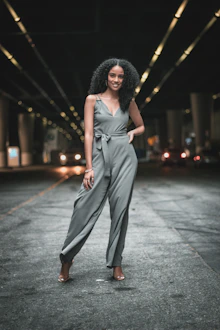 woman standing in the middle of the road