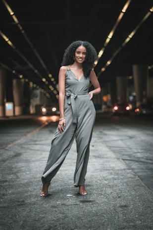 woman standing in the middle of the road