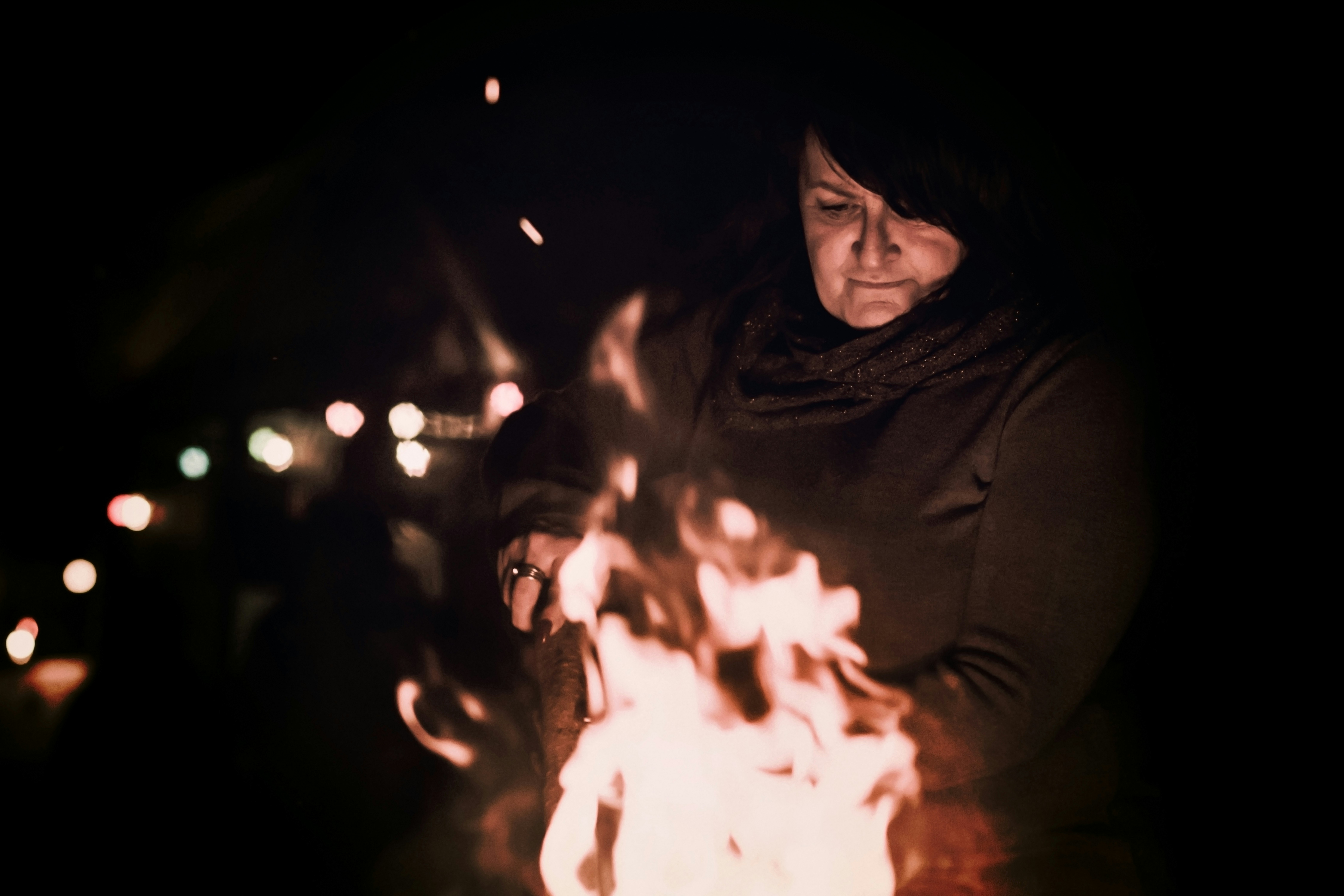 woman near bonfire