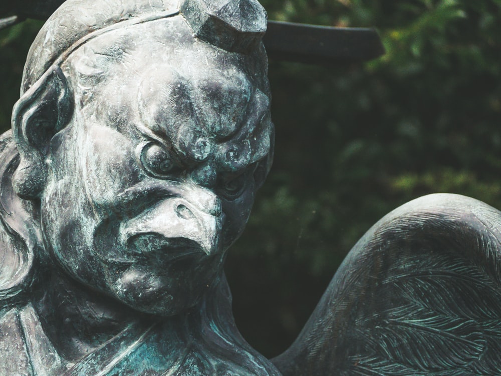 gray concrete eagle statue during daytime