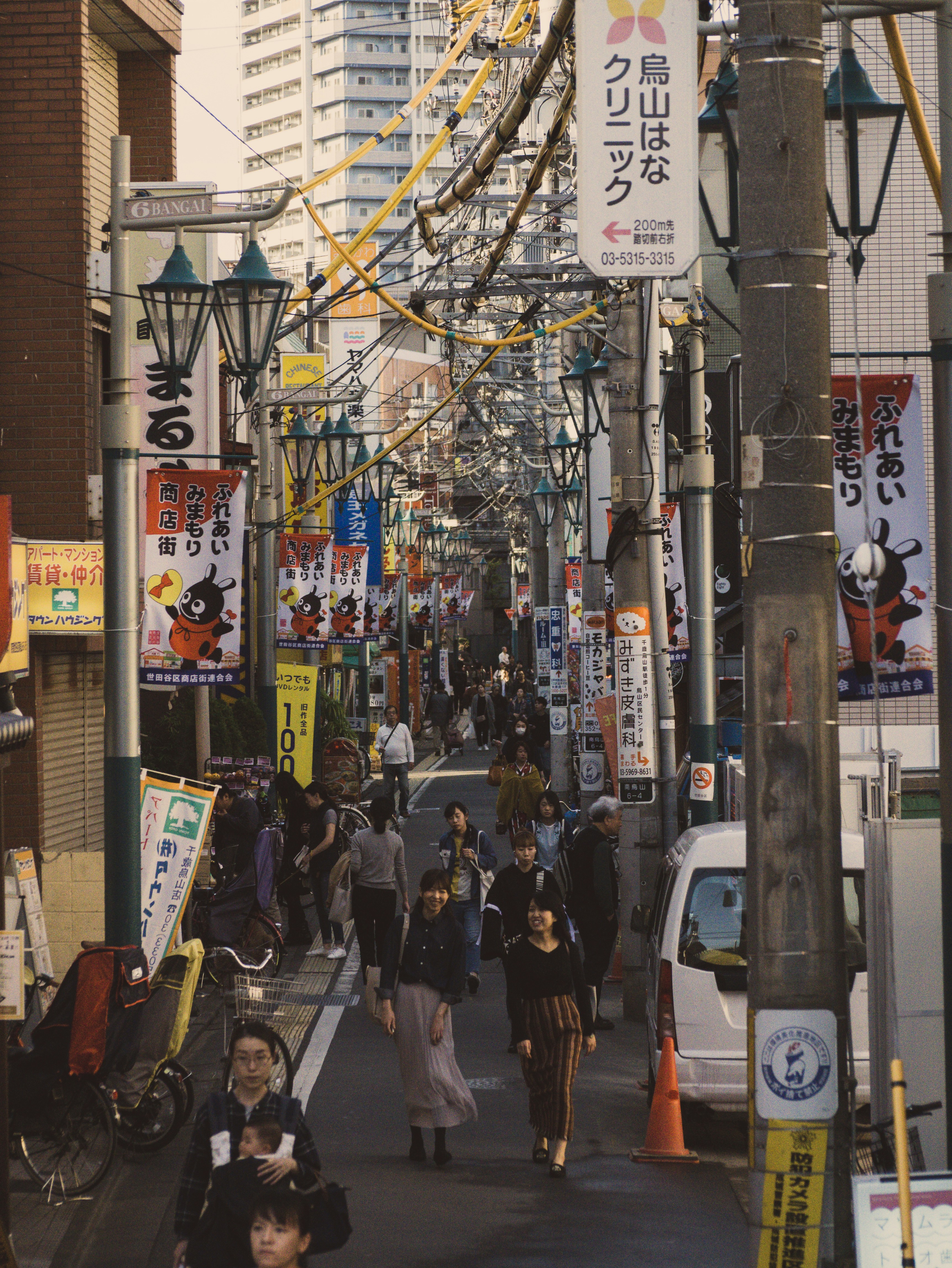 people walking in the street at daytime