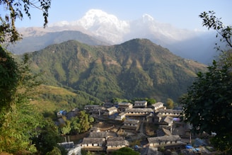 green mountain under white sky