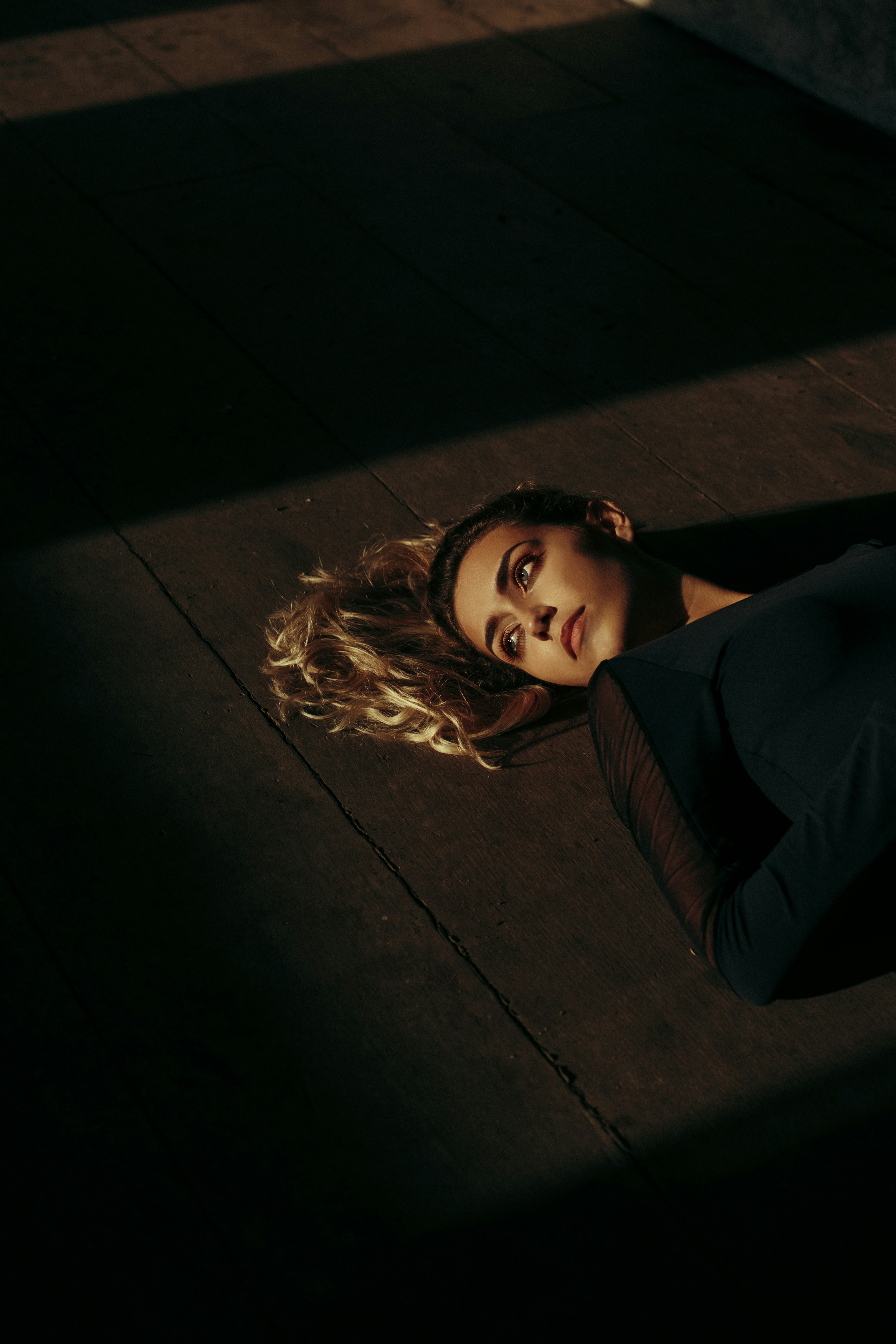 woman lying on floor