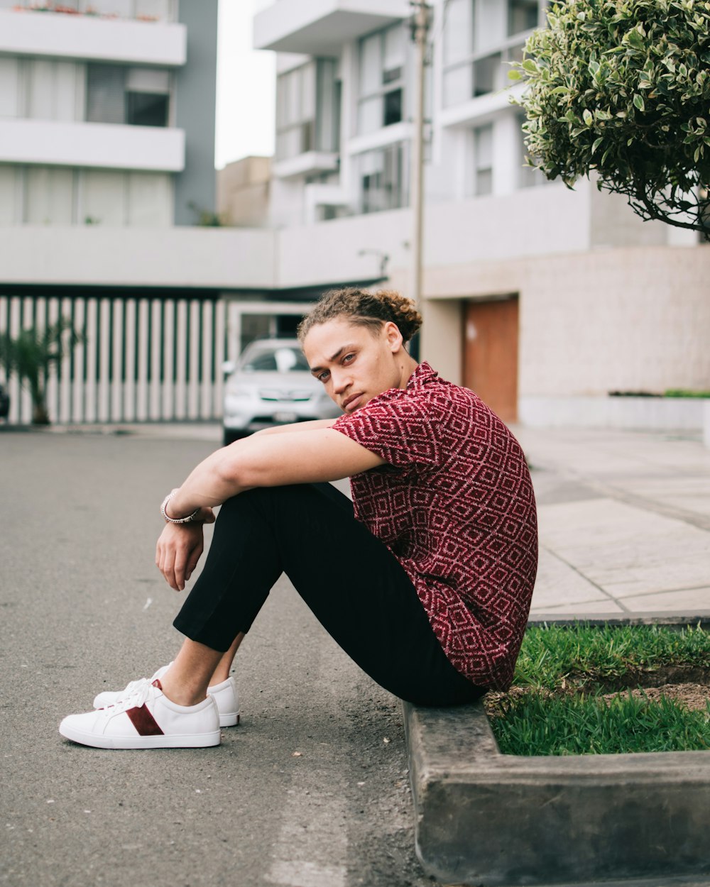 man sitting on ground