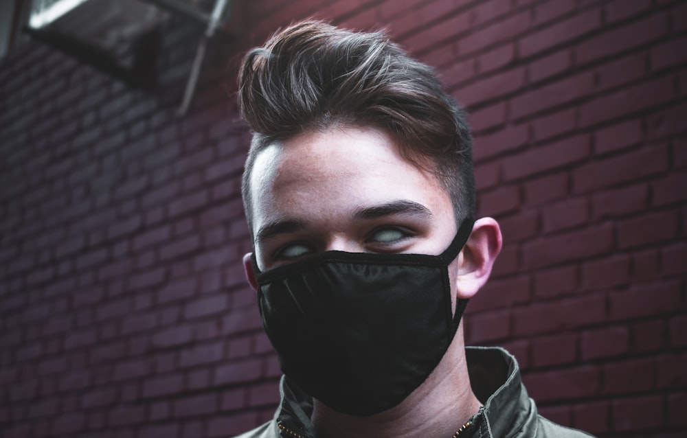 man wearing black face mask