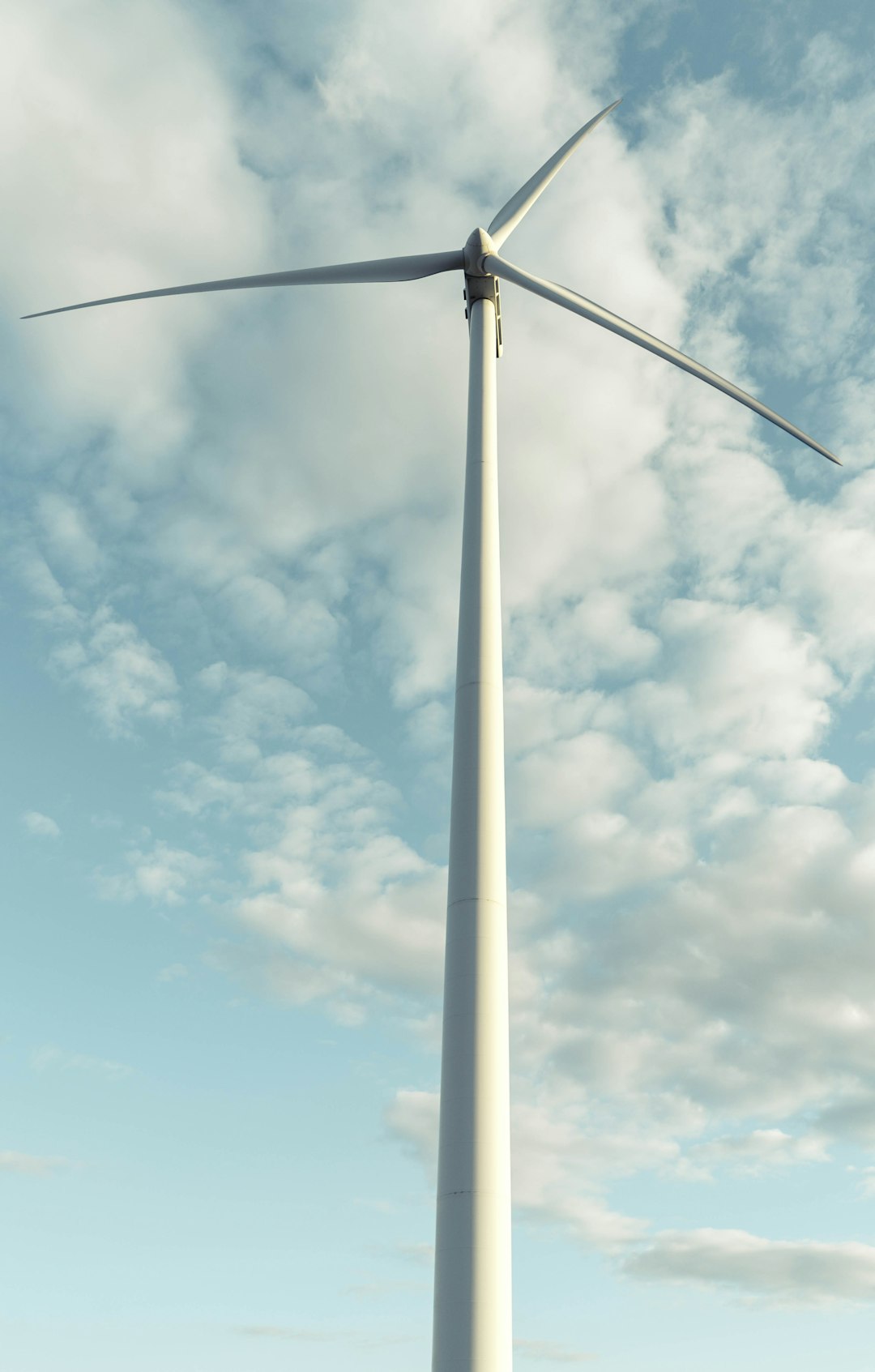 low-angle photograph of white wind turbine