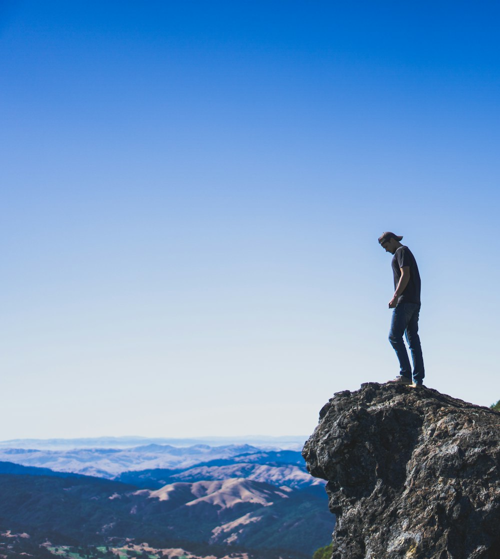 man on cliff