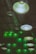 Industrial-style ceiling lamps with a metal grid design emit a soft glow, hanging above a textured wall illuminated with green lighting. Visible ductwork complements the industrial look.