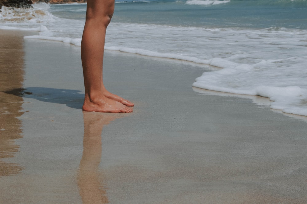 person standing near shore