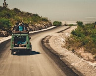 A family enjoying a road trip in a spacious rental vehicle.
