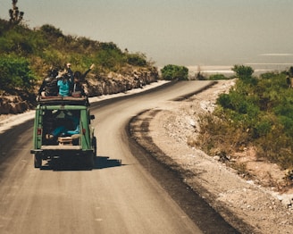 A family enjoying a road trip in a spacious vehicle.