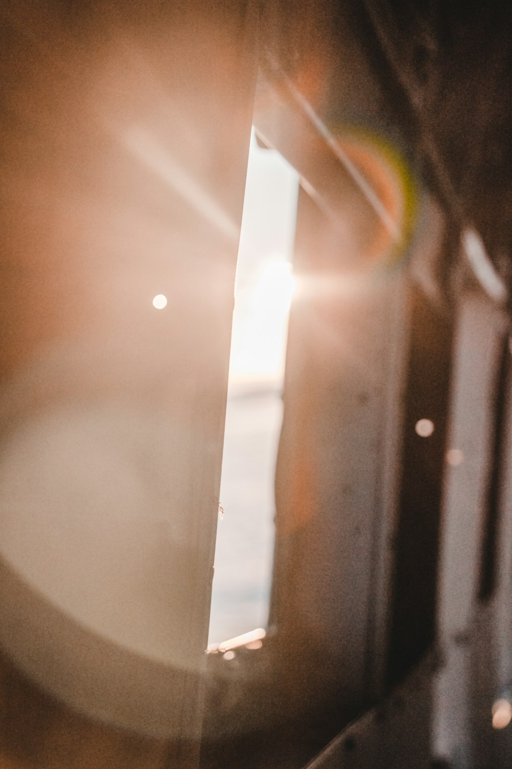 the sun is shining through the window of a building