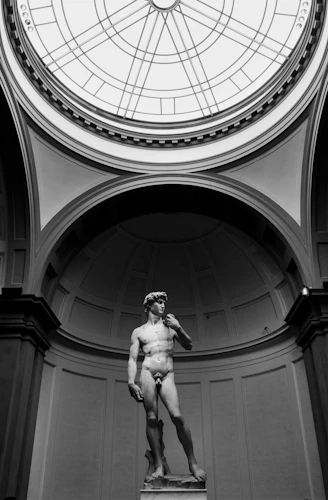 naked man concrete statue