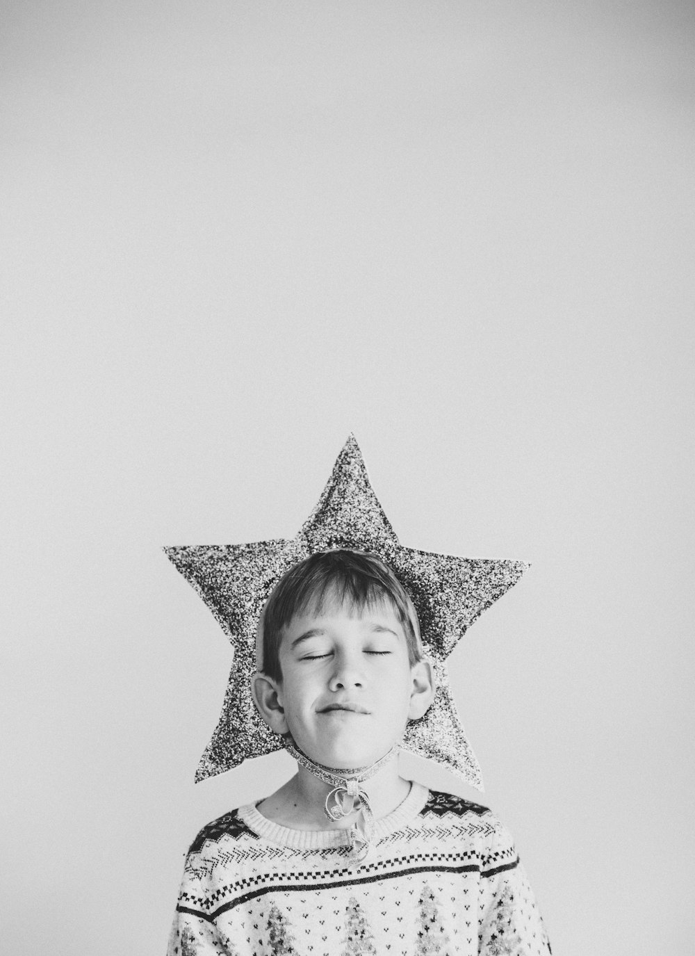 boy wearing star headband
