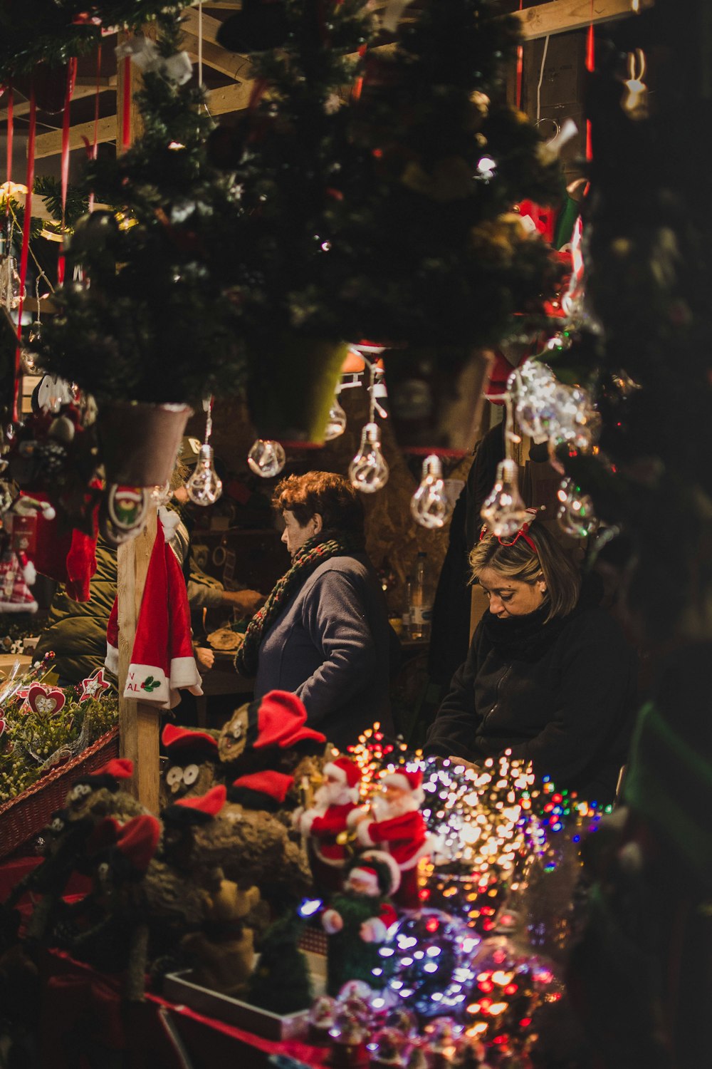 selective focus photo of woman standing inside store