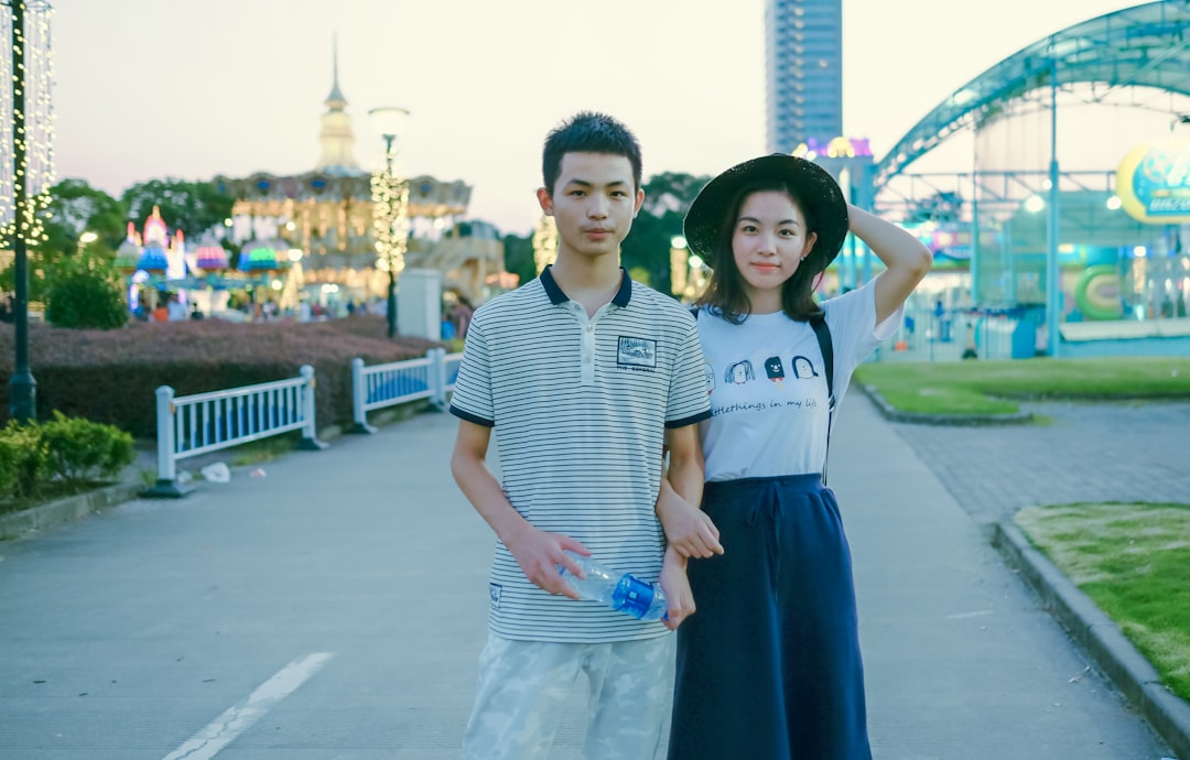 man and woman standing outdoor