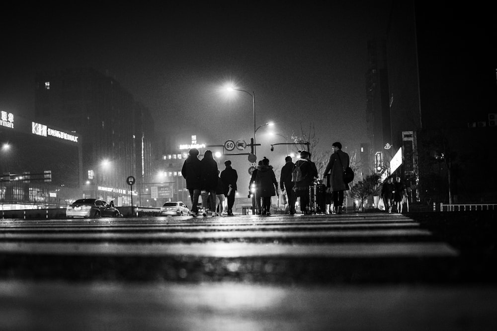 silhouette of people walking on streets