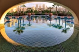 A beautifully renovated pool area with elegant landscaping.