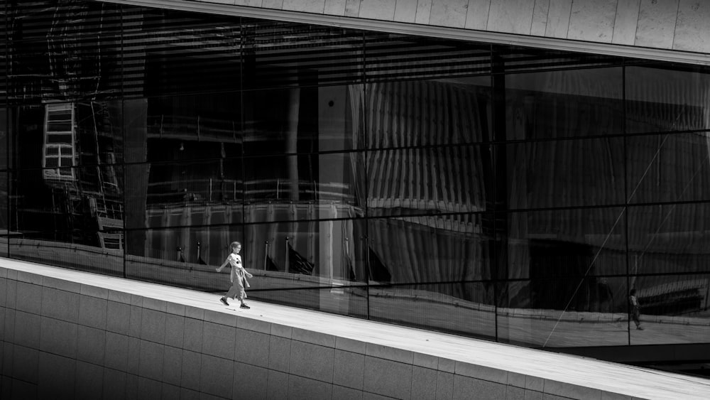 person walking on building