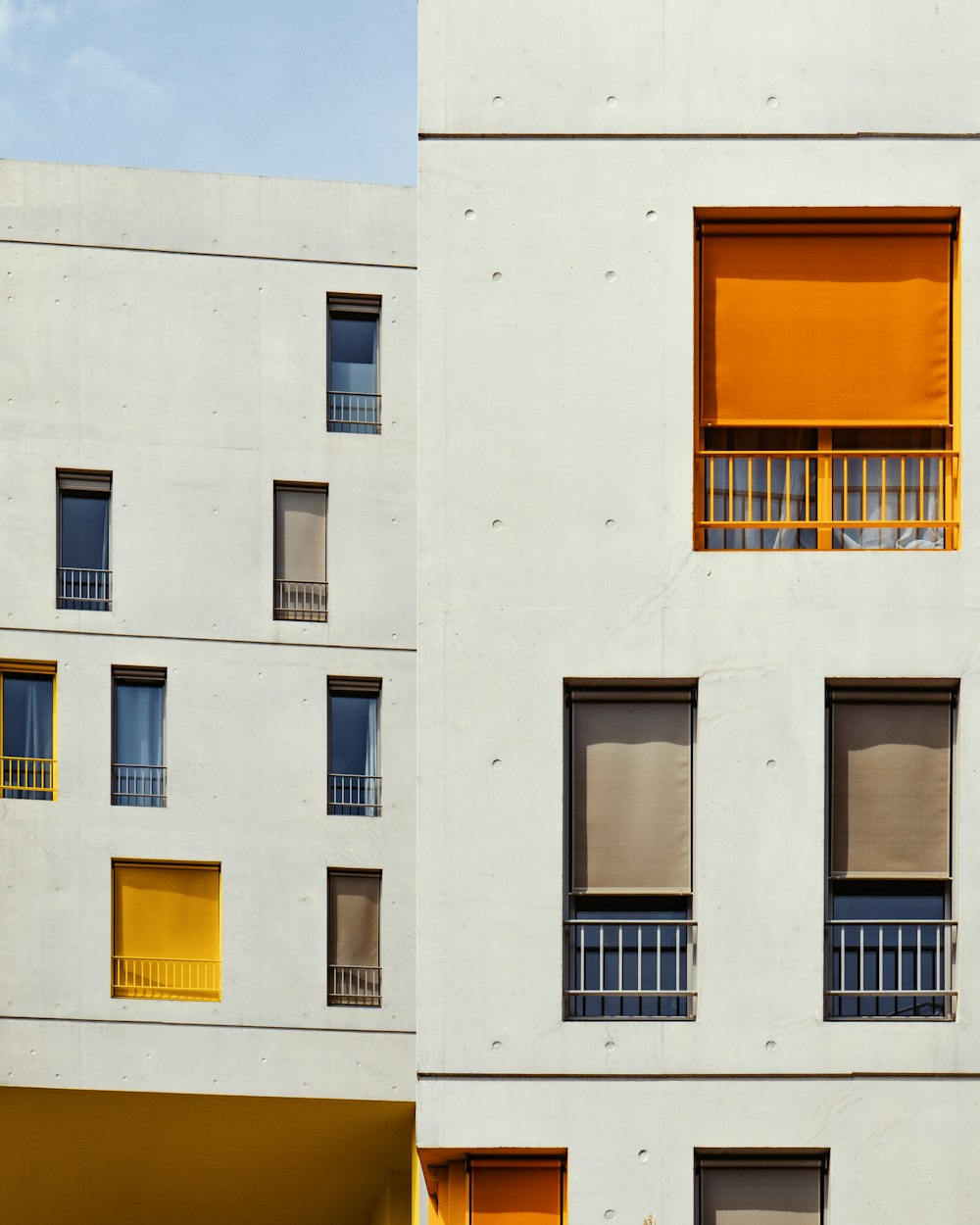 orange steel rails on white building