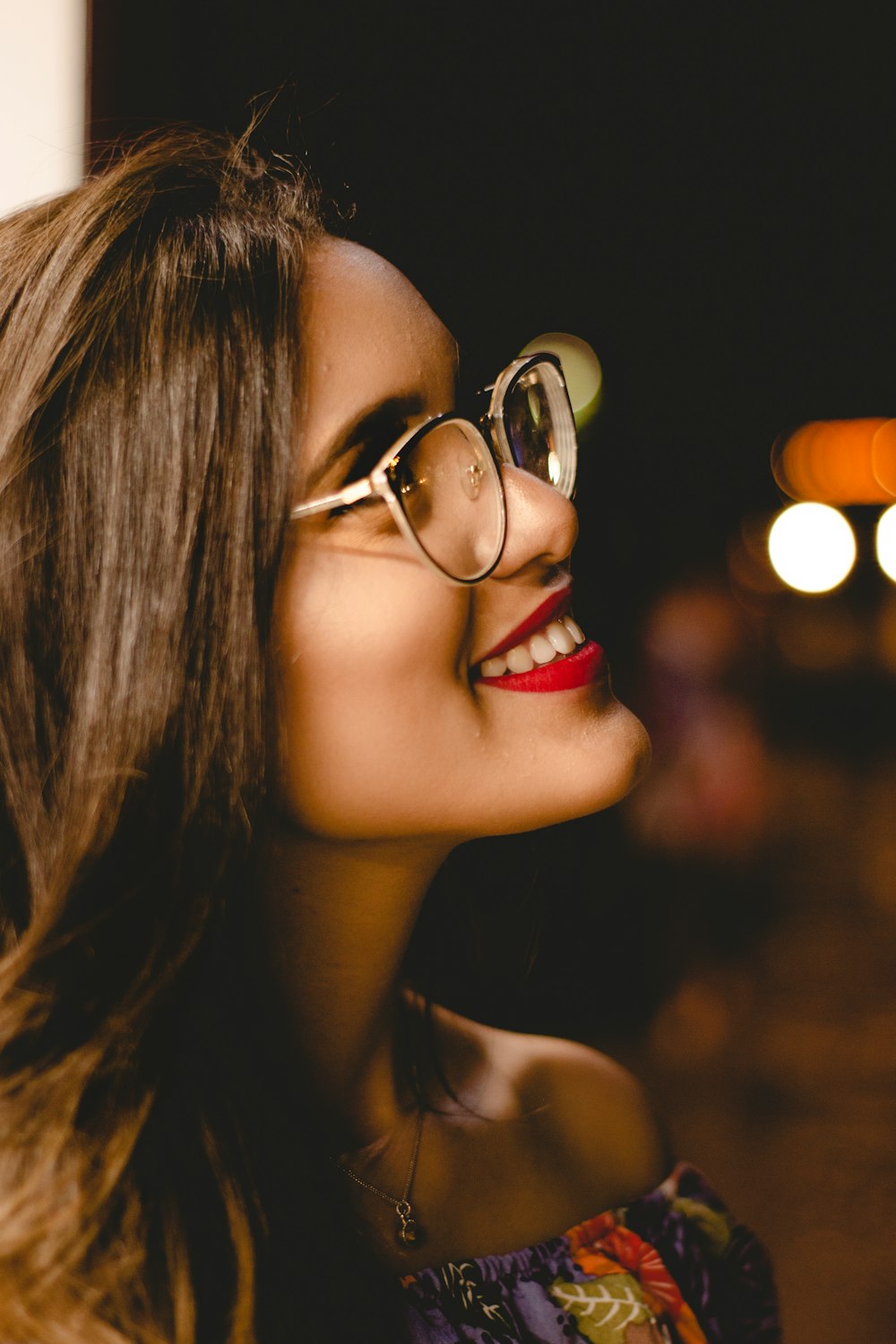 woman wearing gray-framed eyeglasses