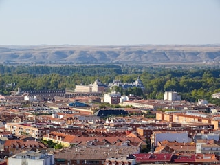 A panoramic view of the Paperino village with its traditional houses and surrounding Tuscan landscape.