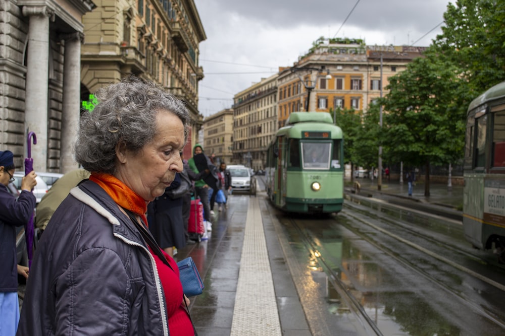 woman standing near train