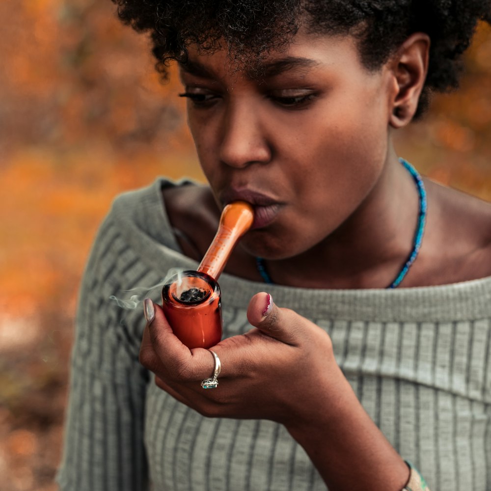 woman using pipe