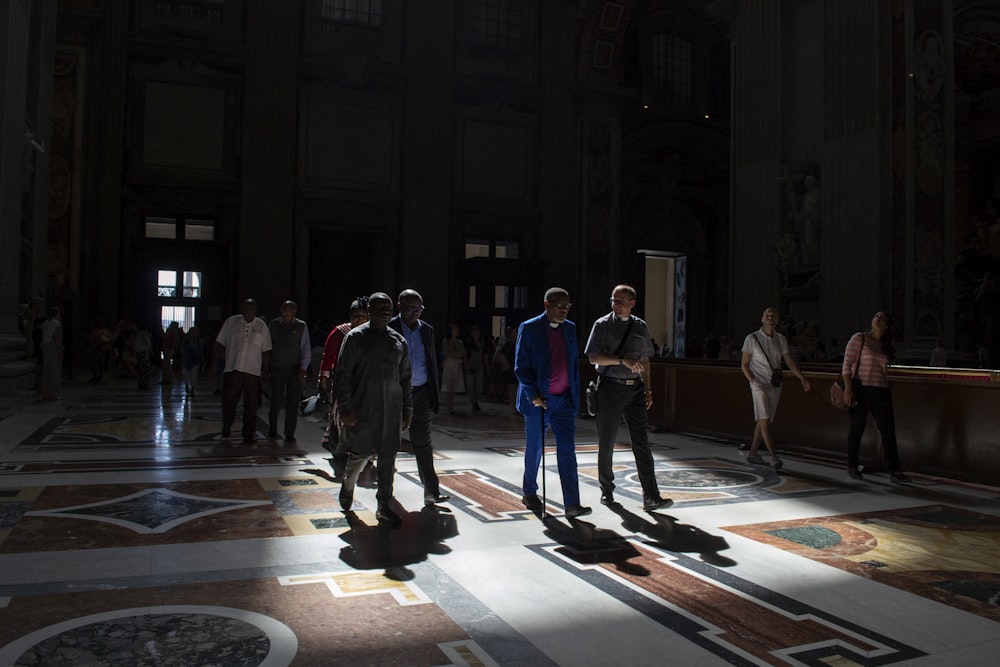 people walking on hall