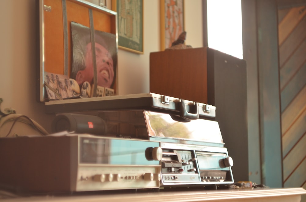 gray stereo component on table indoors