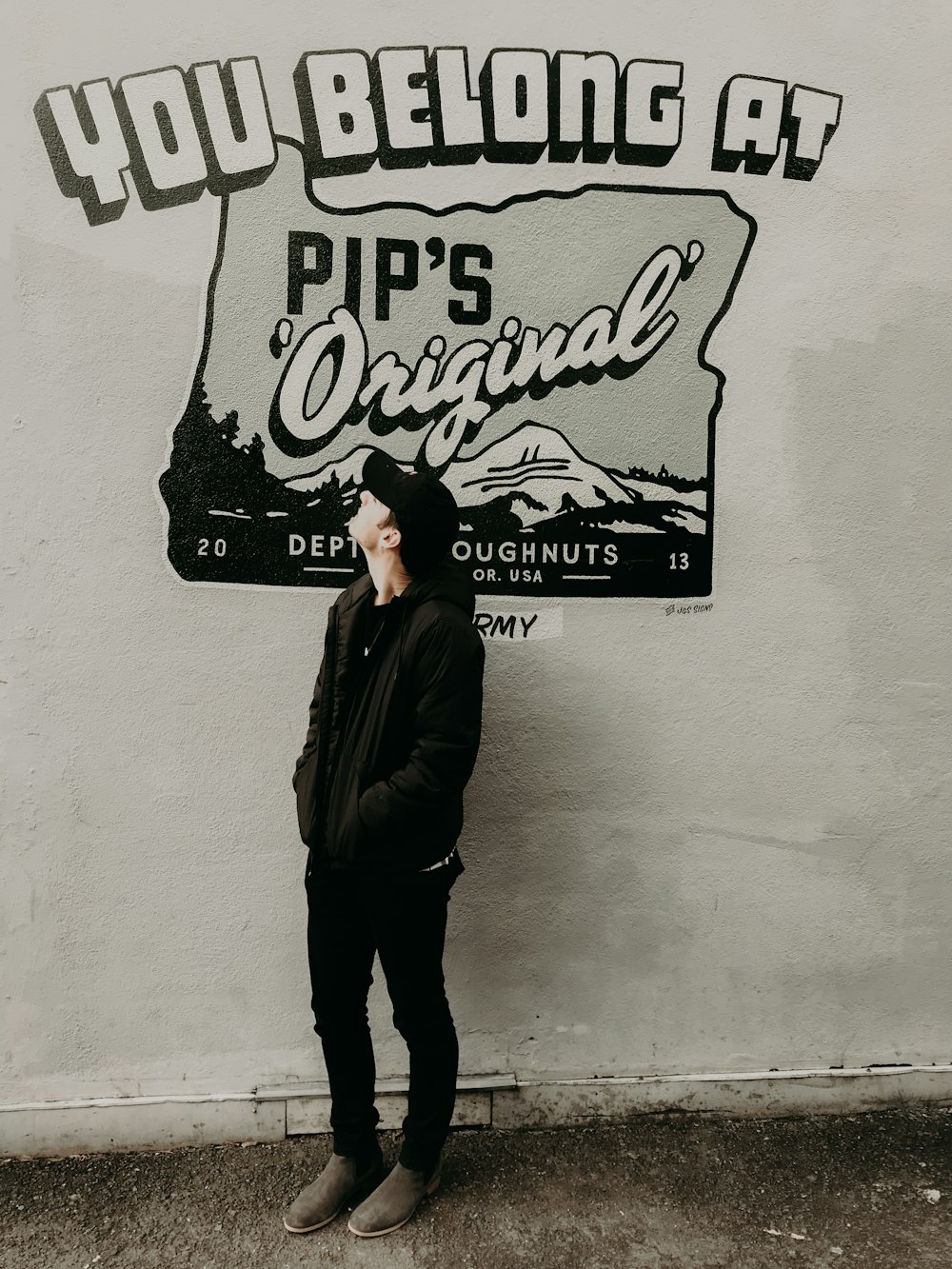 man looking at signage